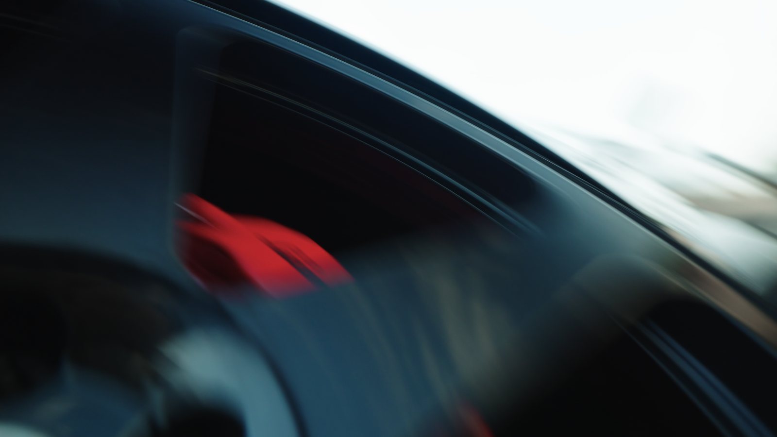 Wheel and brake caliper caught in motion blur